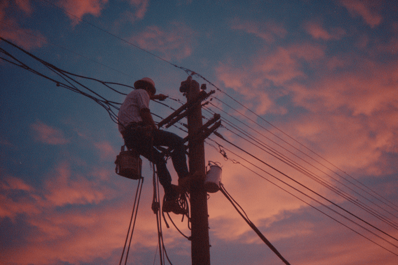 1970s Telephone Lineman Working on Pole Photograph
